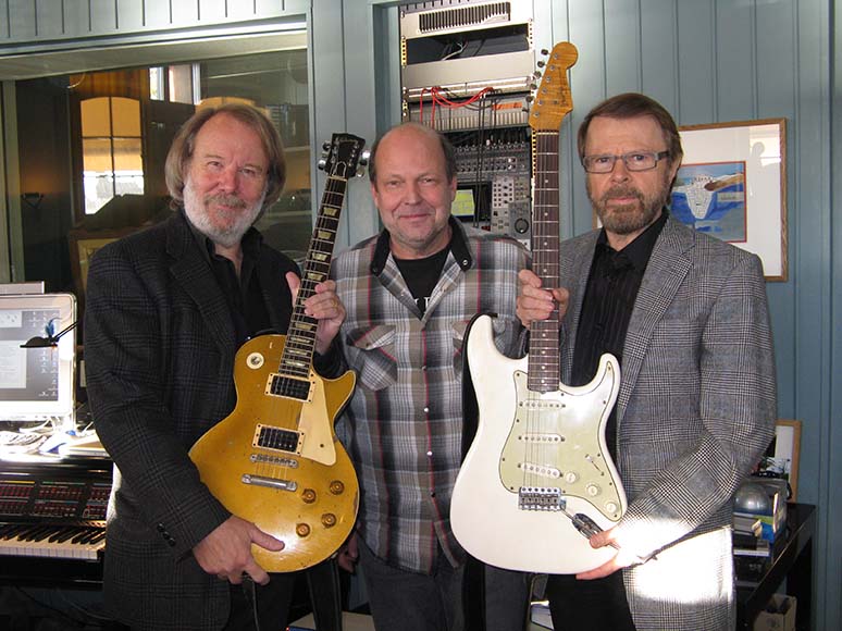 Lasse Wellander together with Björn and Benny and his faithful old servants, a Les Paul -57 and a Strat -62